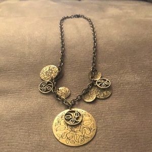 Rich brown chain with leafy pendants